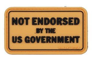Violent Little Machine Shop Not Endorsed by The U.S. Government Morale Patch features a yellow background with black text
